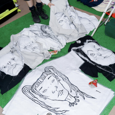 出展者名